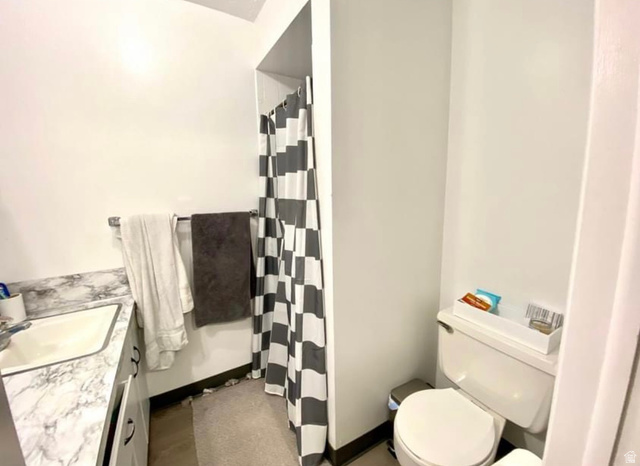 640 East 600 North Logan, UT 84321 - Photo 20 of 20 Bathroom with vanity and a shower with curtain