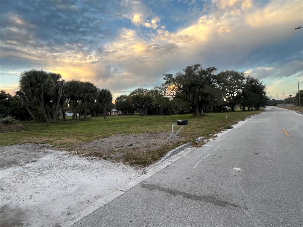 605 North 8th Street Fort Pierce, FL 34950 - Photo 5 of 8 a view of a field with trees in background
