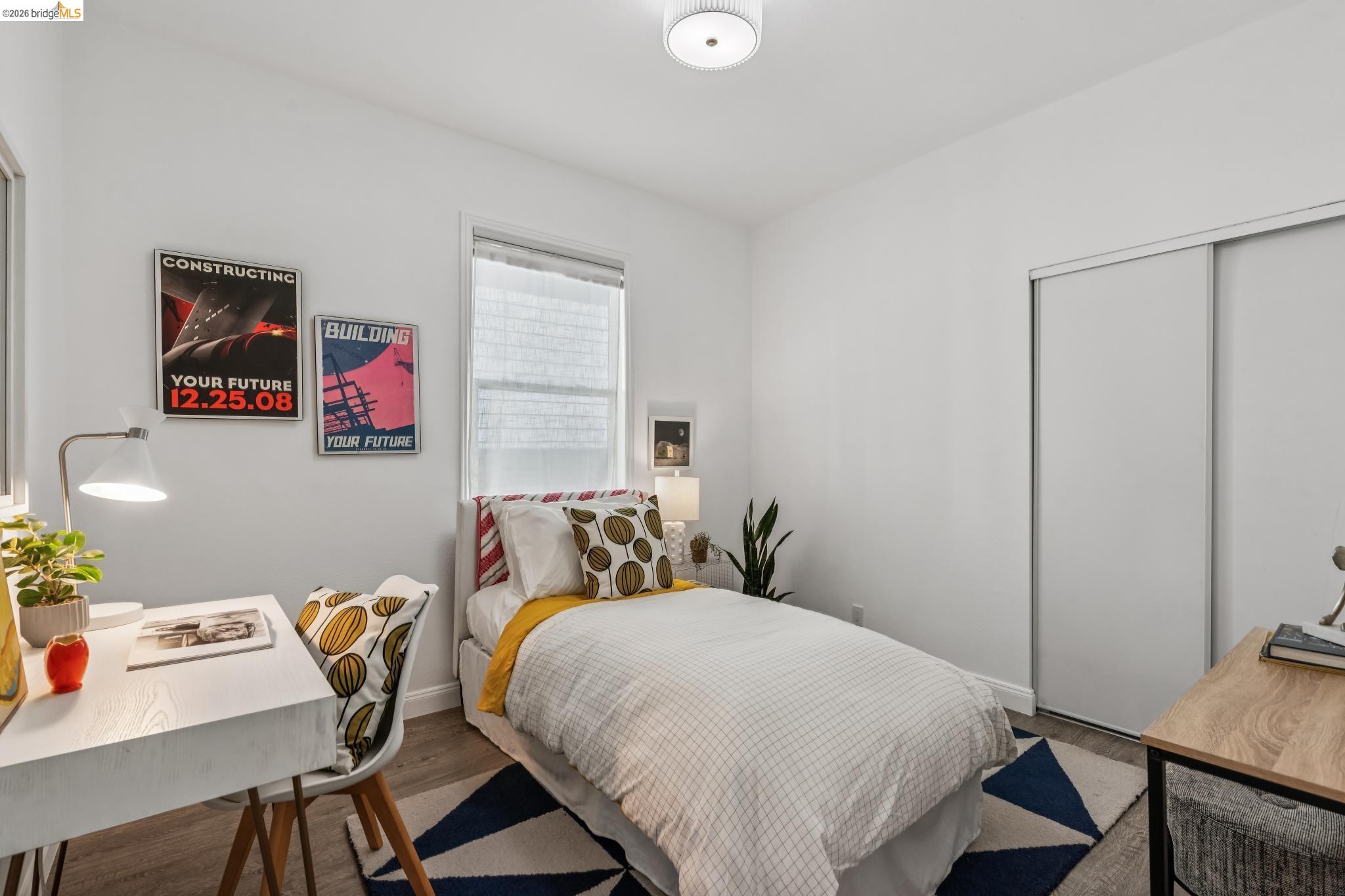 2010 Filbert Street Oakland, CA 94607 - Photo 20 of 50 Bedroom featuring wood finished floors and a closet