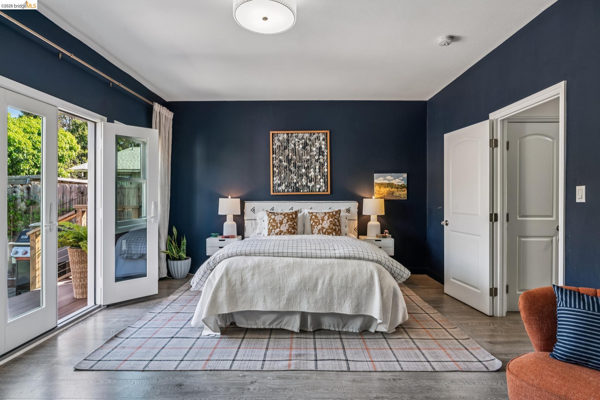 2010 Filbert Street Oakland, CA 94607 - Photo 3 of 50 Bedroom featuring access to outside and wood finished floors