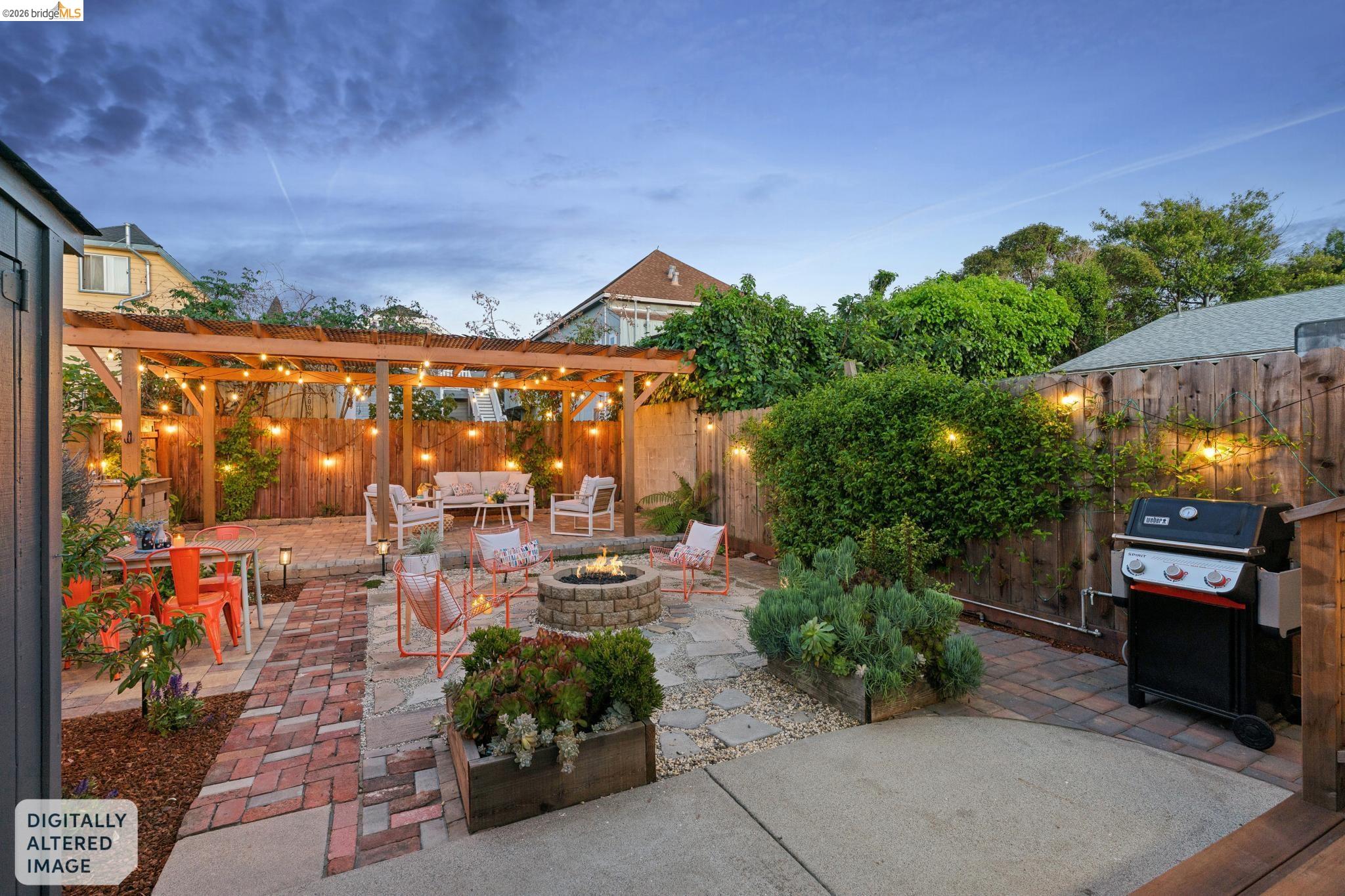 2010 Filbert Street Oakland, CA 94607 - Photo 33 of 50 Patio terrace at dusk with an outdoor living space with a fire pit, a patio, area for grilling, and a fenced backyard