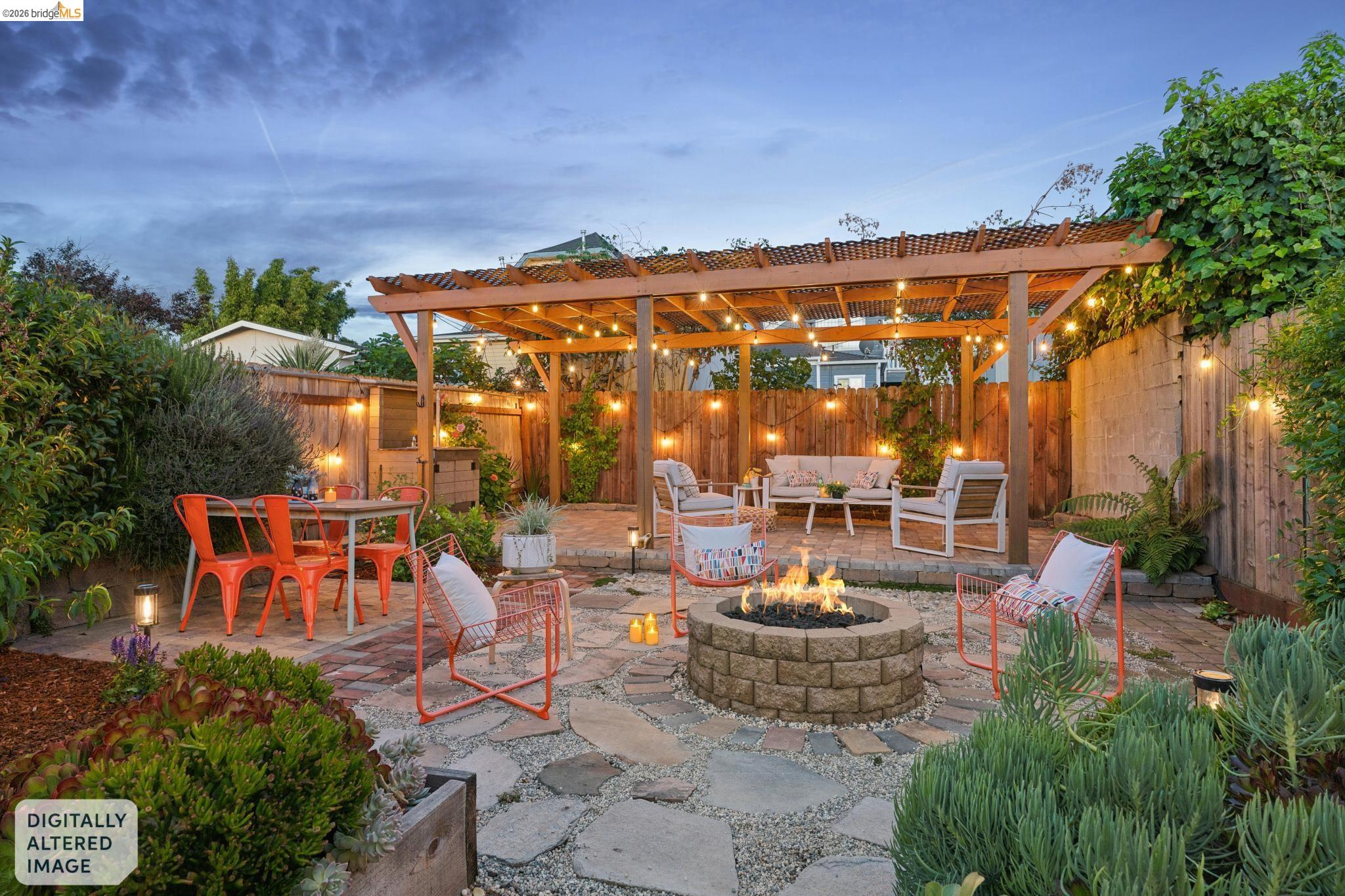 2010 Filbert Street Oakland, CA 94607 - Photo 36 of 50 Fenced backyard featuring a patio area, an outdoor fire pit, a pergola, and outdoor lounge area