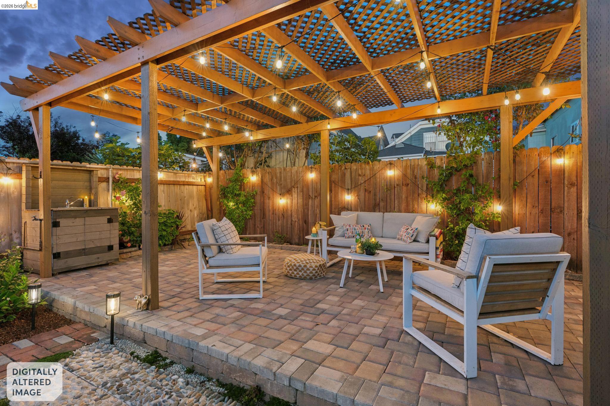 2010 Filbert Street Oakland, CA 94607 - Photo 40 of 50 Fenced backyard featuring an outdoor living space and a patio area