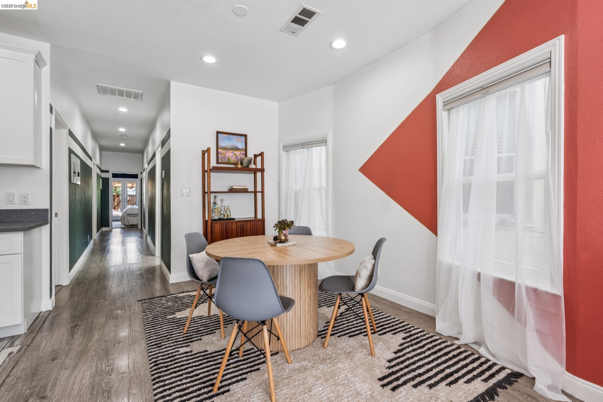 2010 Filbert Street Oakland, CA 94607 - Photo 10 of 50 Dining space with recessed lighting and wood finished floors
