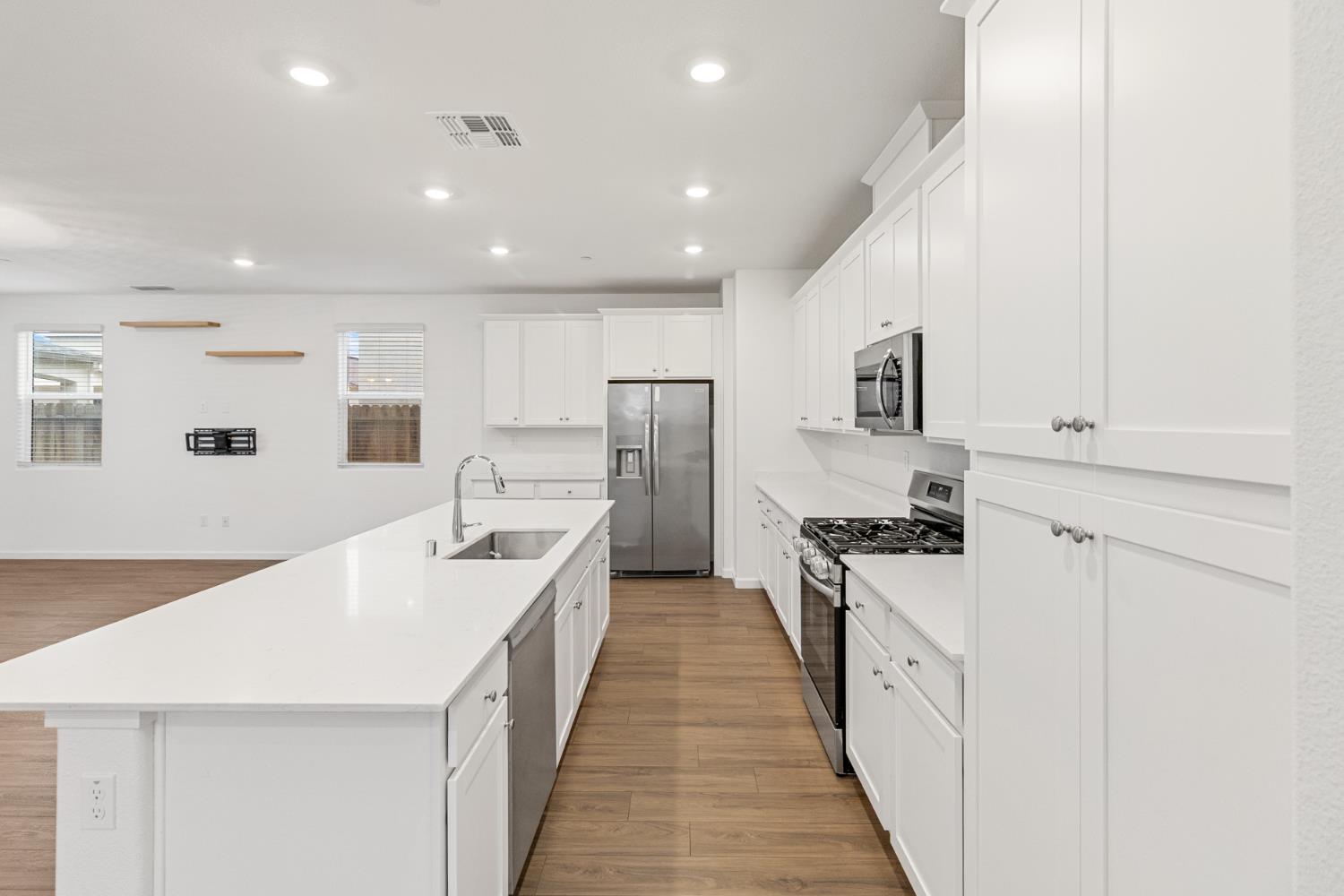 8809 Boes Way Sacramento, CA 95829 - Photo 17 of 40 a large kitchen with stainless steel appliances lots of counter top space