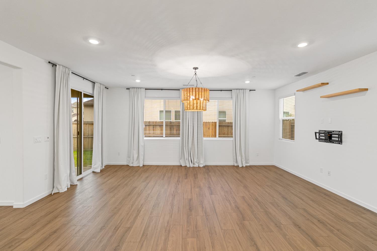 8809 Boes Way Sacramento, CA 95829 - Photo 22 of 40 wooden floor in an empty room with a window