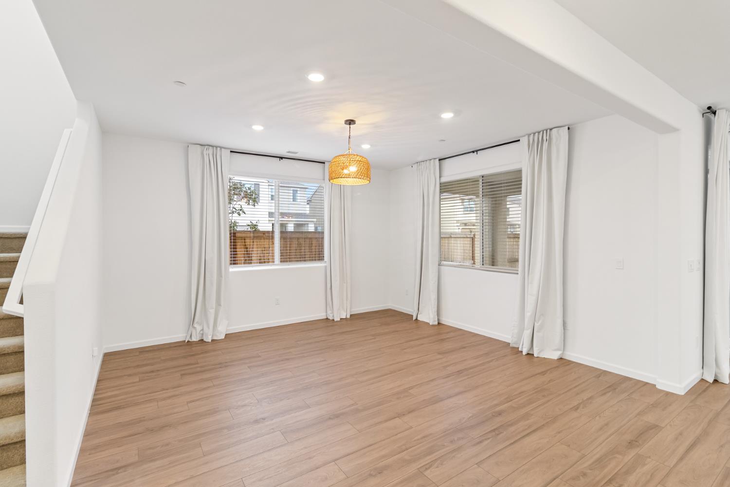 8809 Boes Way Sacramento, CA 95829 - Photo 24 of 40 a view of empty room with wooden floor and window