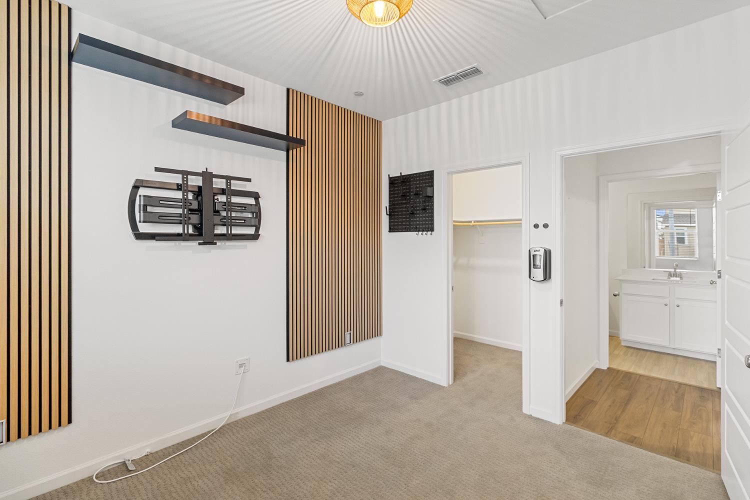 8809 Boes Way Sacramento, CA 95829 - Photo 31 of 40 a view of a hallway with bathroom