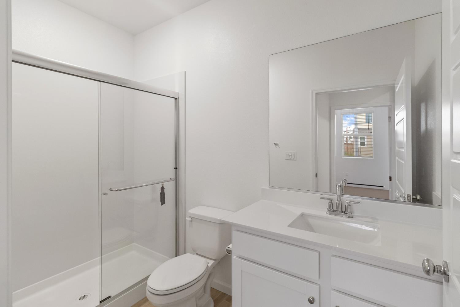 8809 Boes Way Sacramento, CA 95829 - Photo 32 of 40 a bathroom with a sink toilet and shower