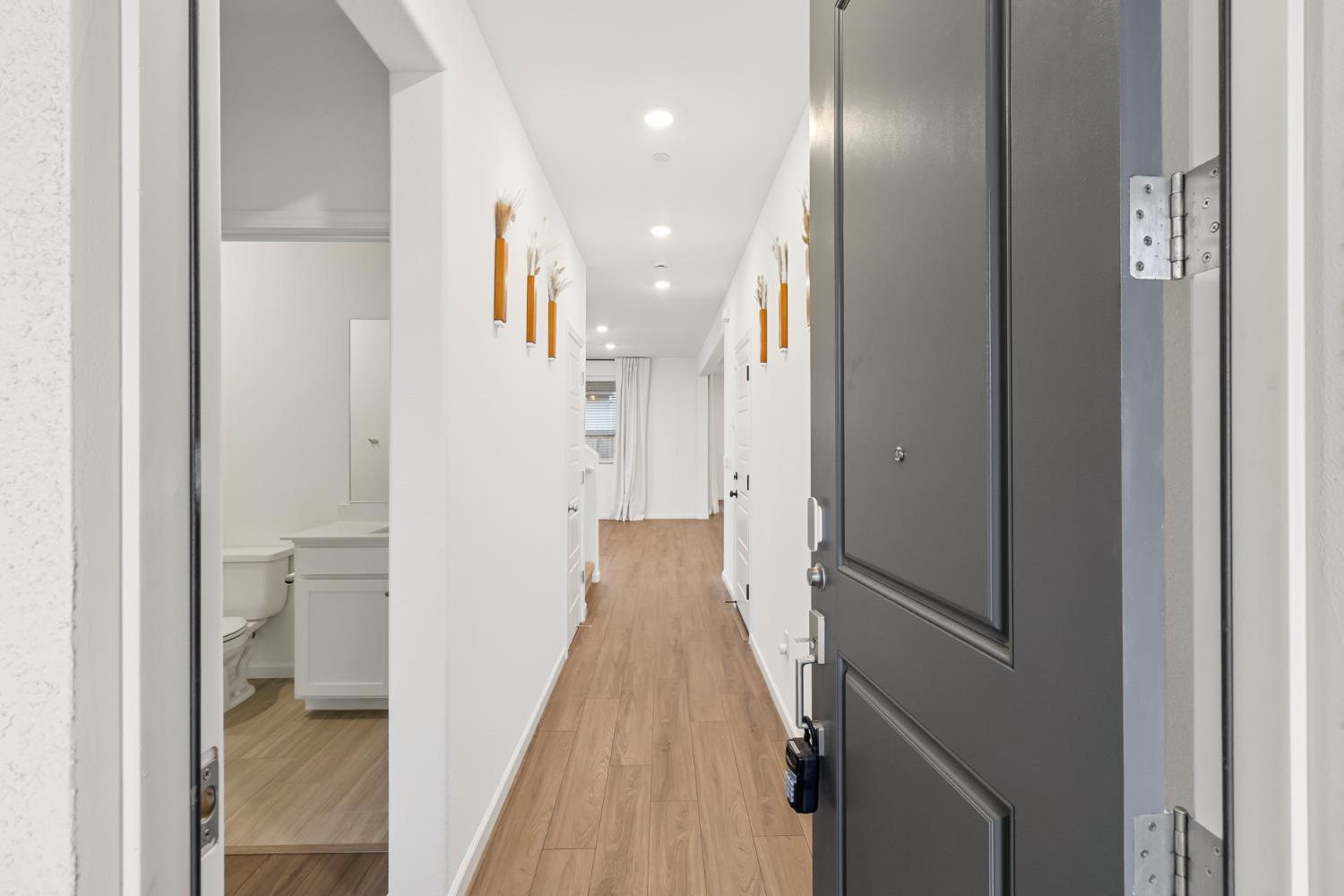 8809 Boes Way Sacramento, CA 95829 - Photo 5 of 40 a view of hallway with wooden floor