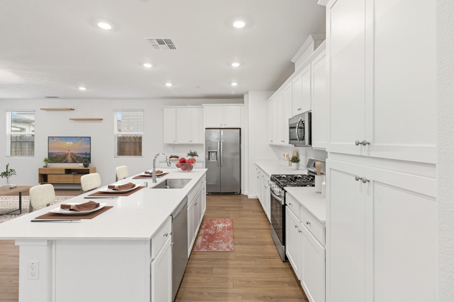 8809 Boes Way Sacramento, CA 95829 - Photo 7 of 40 a kitchen with refrigerator a stove and a sink