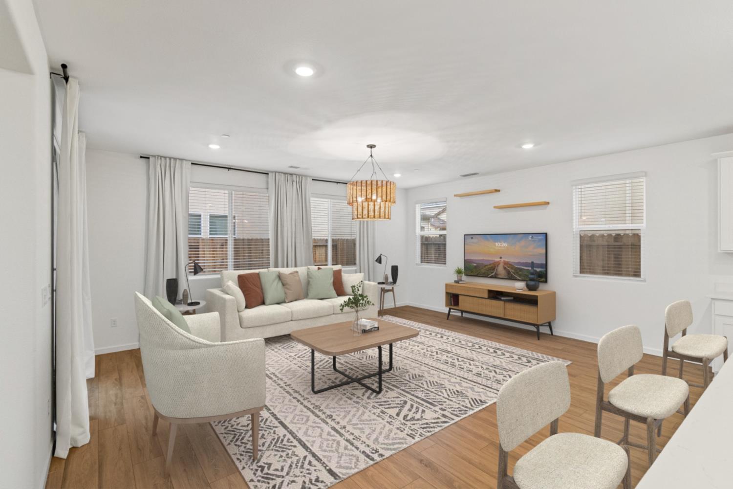8809 Boes Way Sacramento, CA 95829 - Photo 9 of 40 a living room with furniture a flat screen tv and a large window