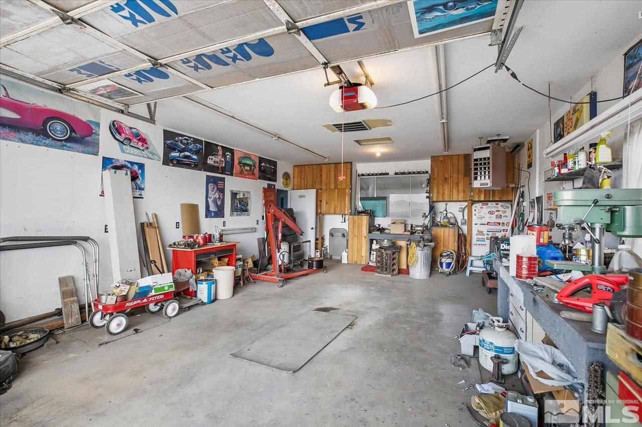 10200 Placerville Road Reno, NV 89508 - Photo 30 of 31 a view of a garage with rack and bicycle
