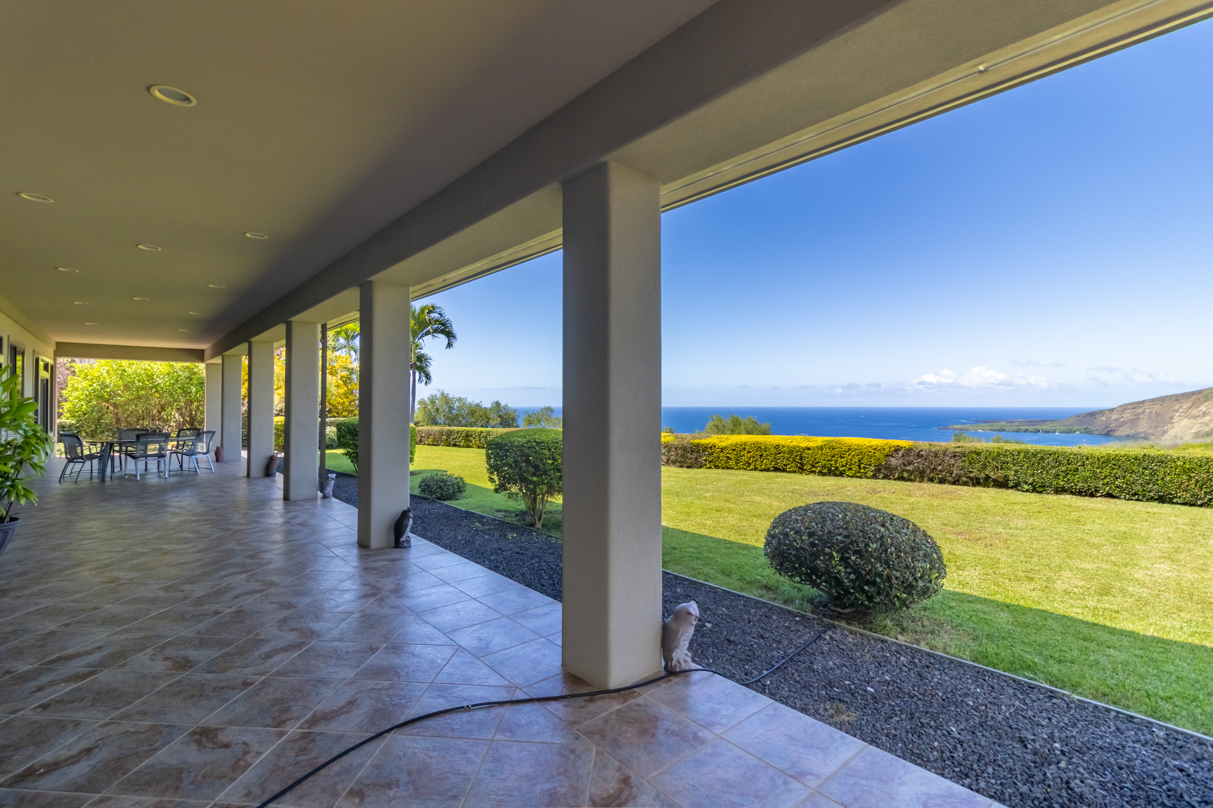 82-1171 Meli Road Captain Cook, HI 96704 - Photo 23 of 29 a view of outdoor space deck and floor to ceiling window