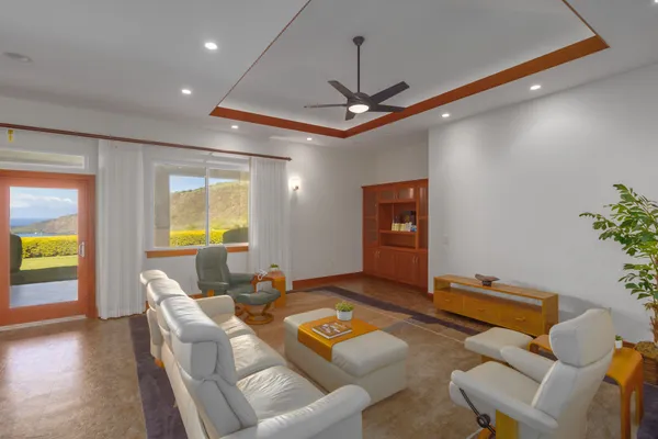 a dining room with furniture and window