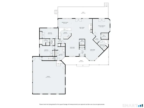 a front view of a residential apartment building with a yard