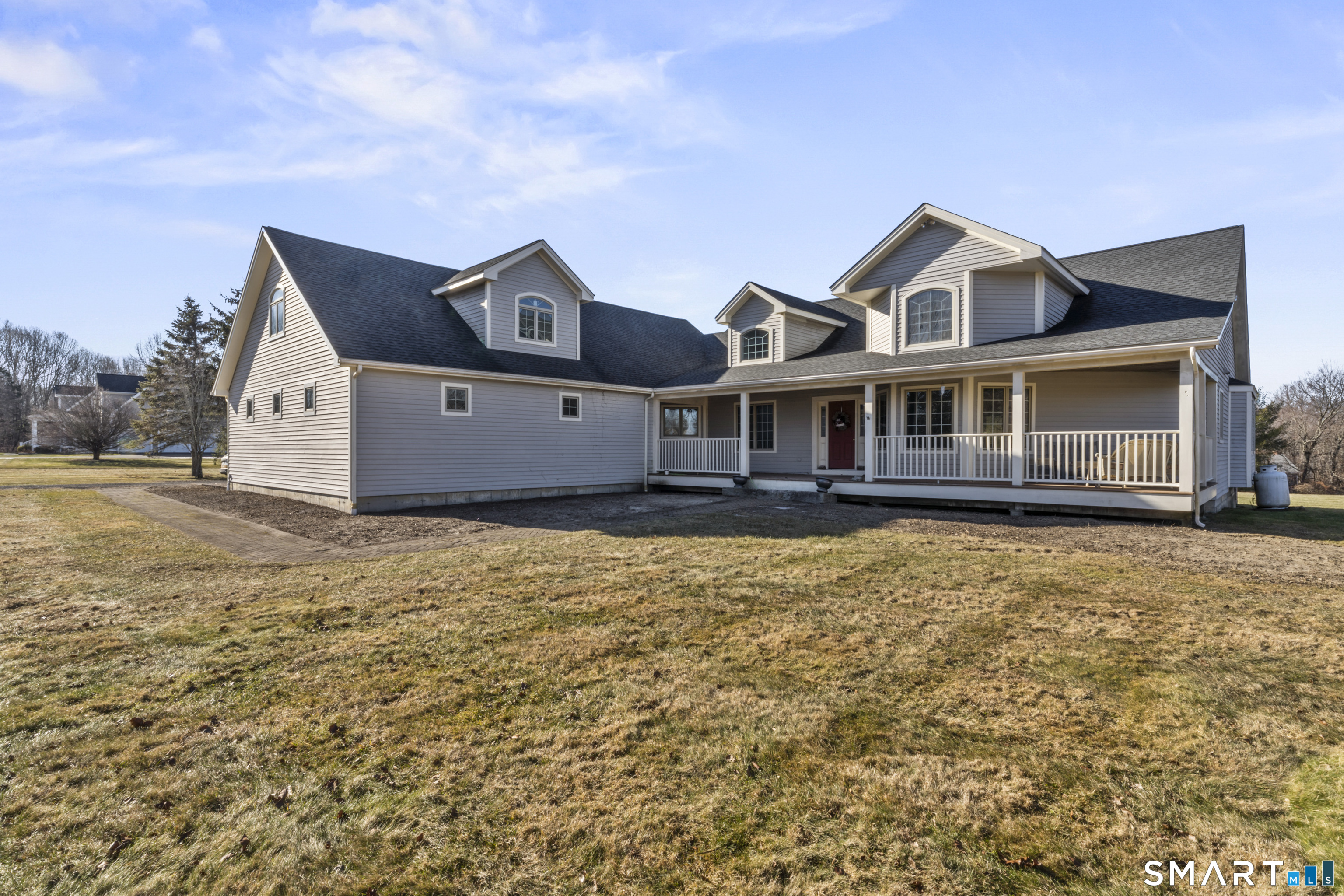 7 Lower County Road Roxbury, CT 06783 - Photo 2 of 40 a front view of a house with a yard