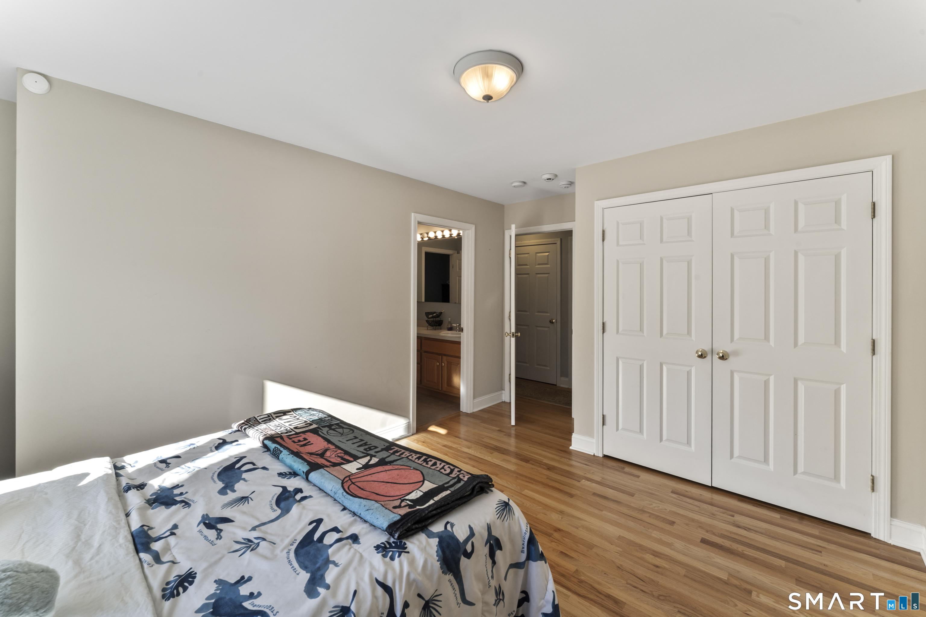 7 Lower County Road Roxbury, CT 06783 - Photo 23 of 40 a bedroom with a bed and a window