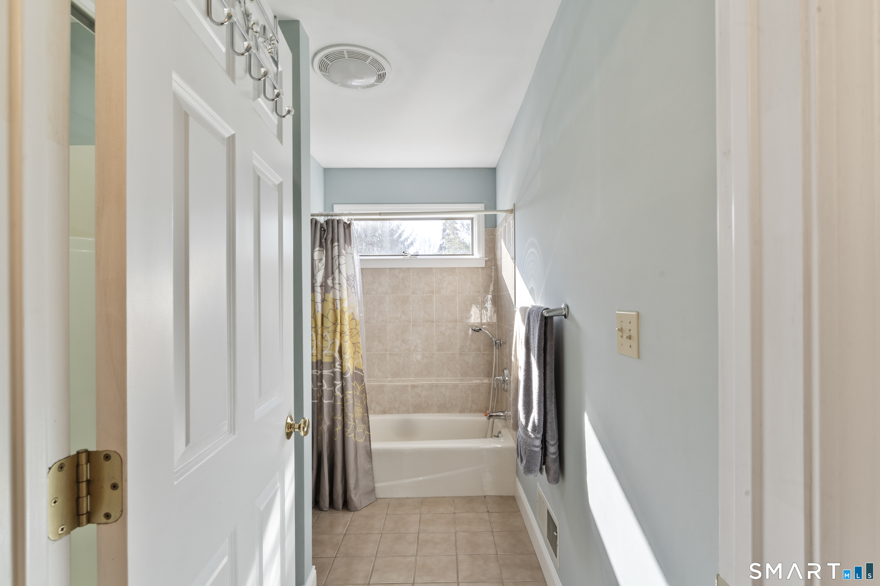 7 Lower County Road Roxbury, CT 06783 - Photo 25 of 40 a bathroom with a glass shower door