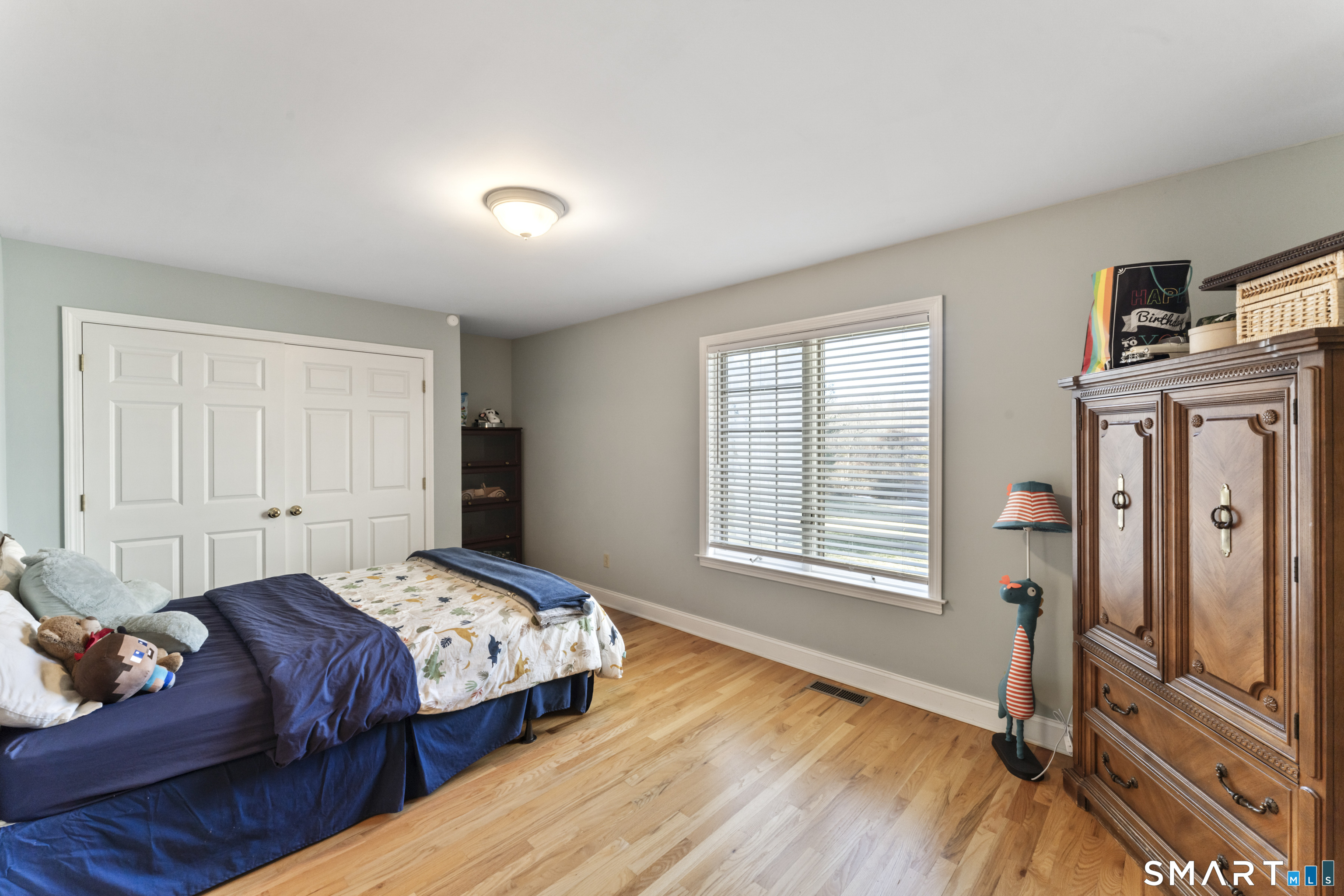 7 Lower County Road Roxbury, CT 06783 - Photo 26 of 40 a bedroom with a bed next to a window