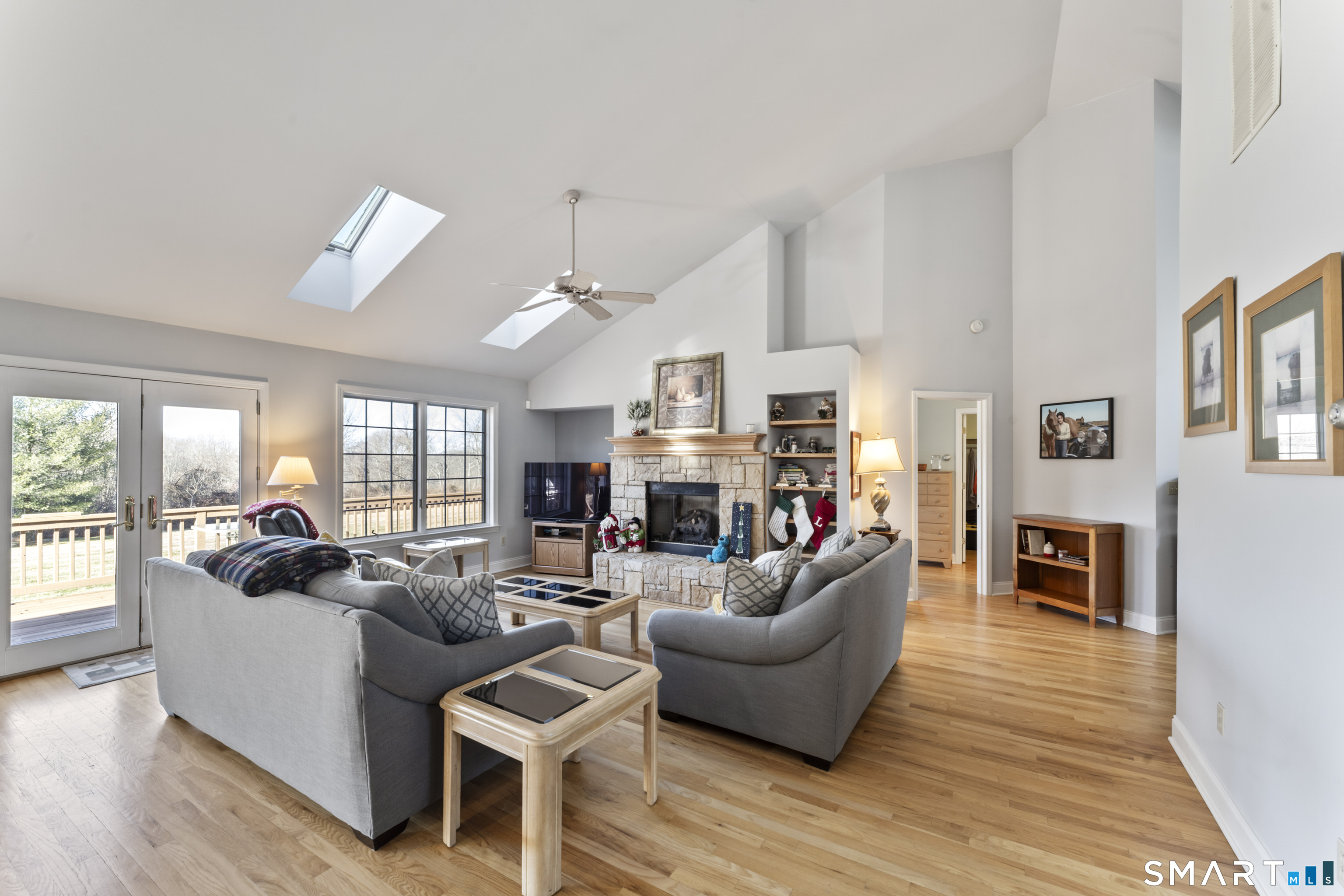 7 Lower County Road Roxbury, CT 06783 - Photo 3 of 40 a living room with fireplace furniture and a wooden floor