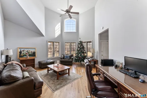 a bathroom with a glass shower door
