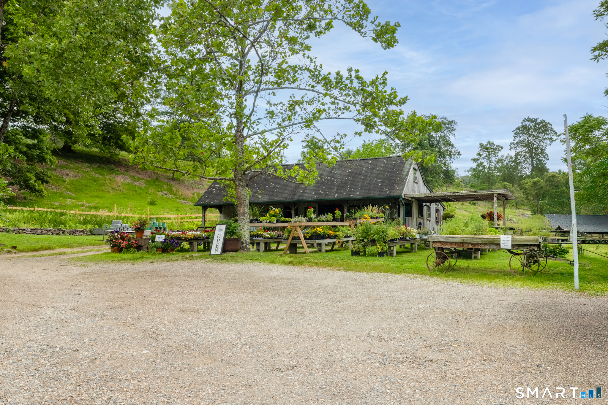 7 Lower County Road Roxbury, CT 06783 - Photo 39 of 40 a view of a house with a yard and sitting area