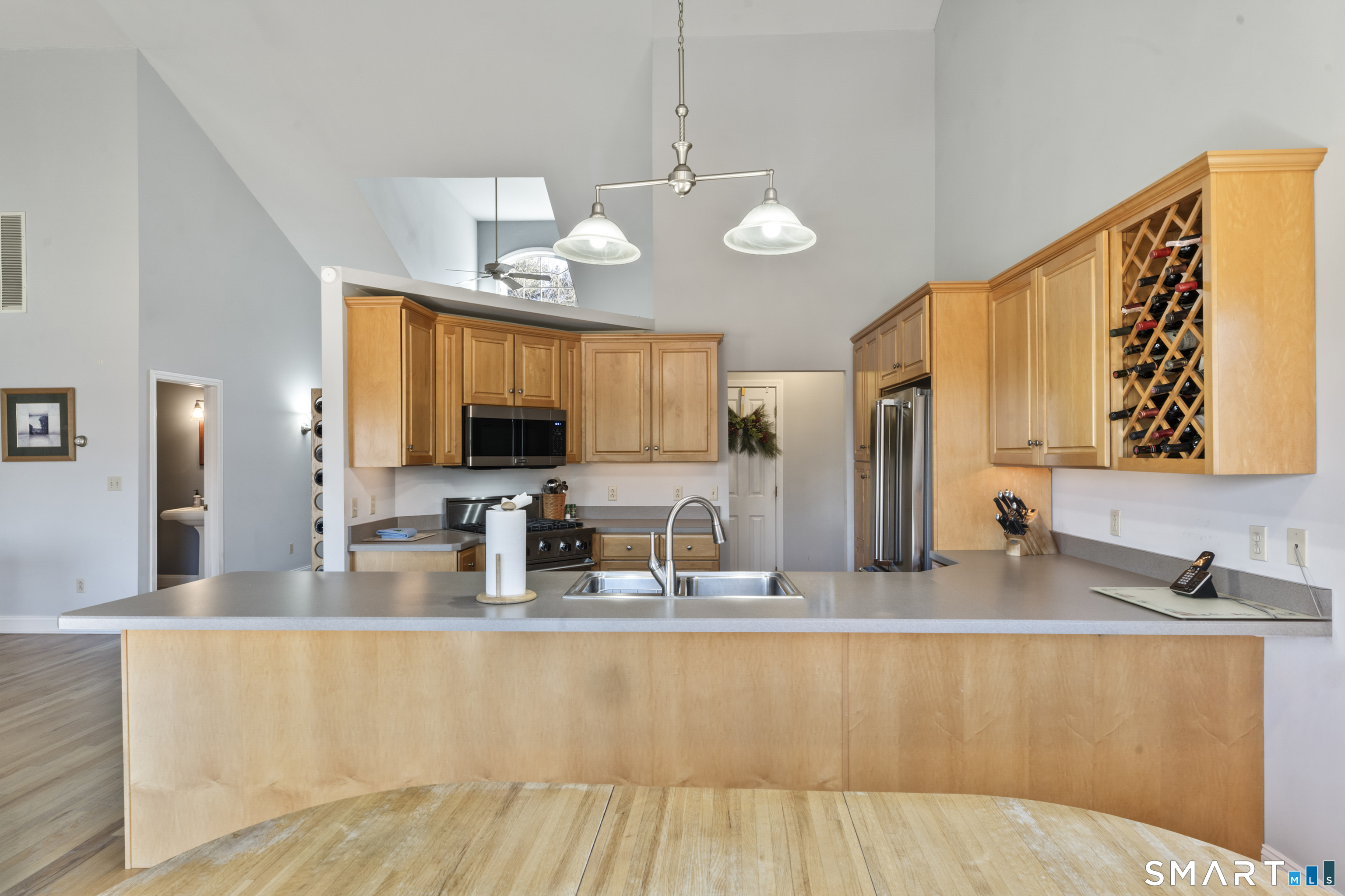 7 Lower County Road Roxbury, CT 06783 - Photo 8 of 40 a kitchen with granite countertop a sink and a large mirror