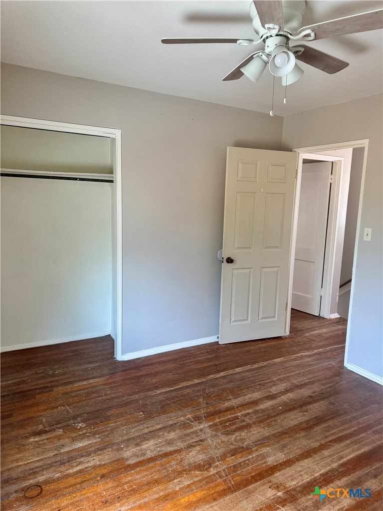 3001 East Rio Grande Street Victoria, TX 77901 - Photo 16 of 20 a view of an empty room with wooden floor