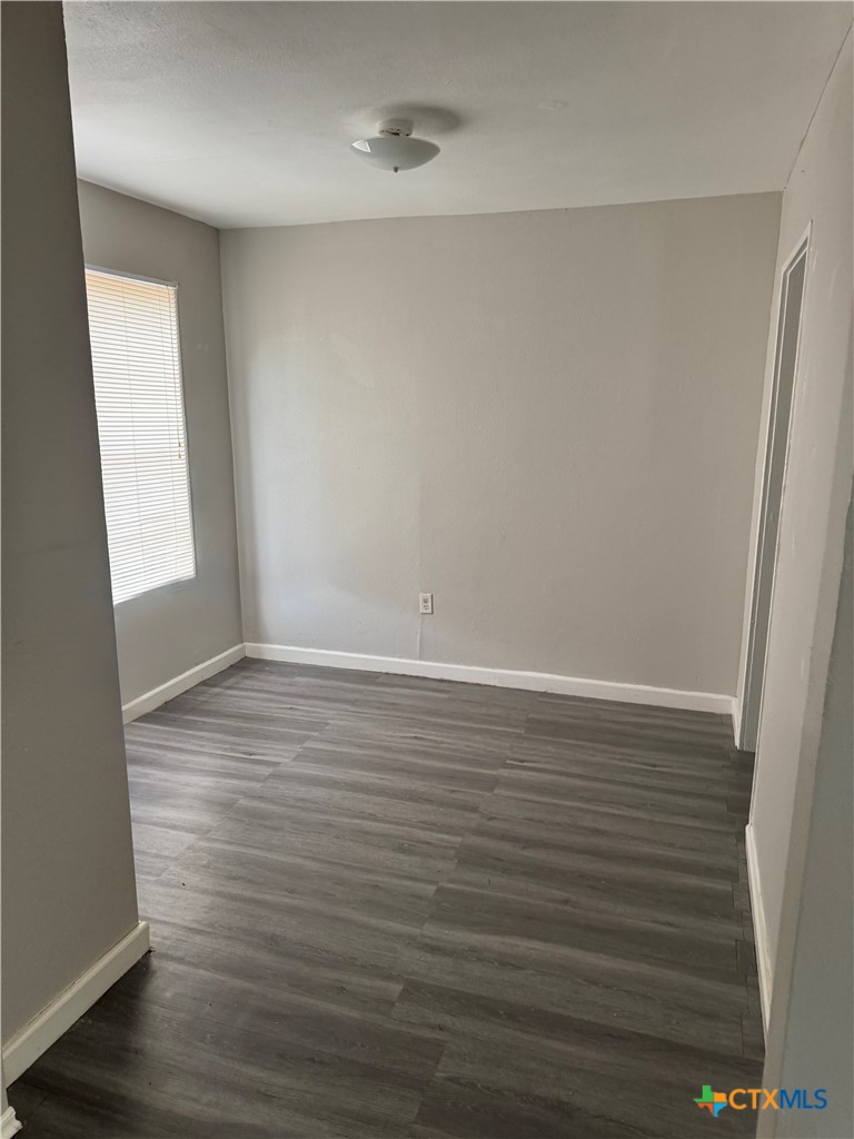 3001 East Rio Grande Street Victoria, TX 77901 - Photo 6 of 20 wooden floor in an empty room