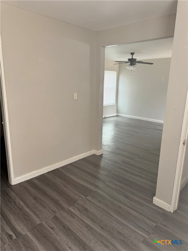 3001 East Rio Grande Street Victoria, TX 77901 - Photo 7 of 20 wooden floor in an empty room