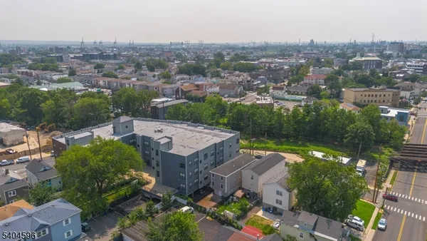 an aerial view of a house with a garden