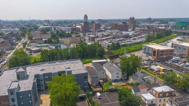 an aerial view of a city with lots of residential buildings