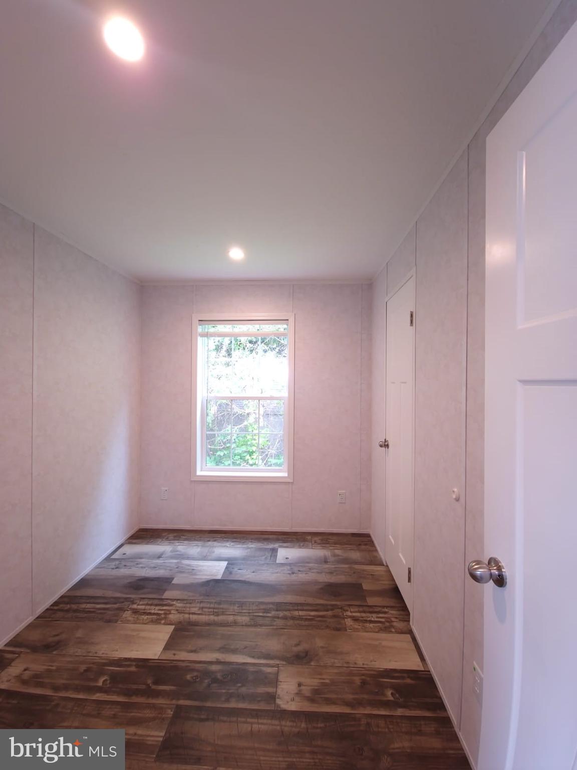 13 Montrose Boulevard Reading, PA 19607 - Photo 22 of 28 a view of an empty room with wooden floor and a window
