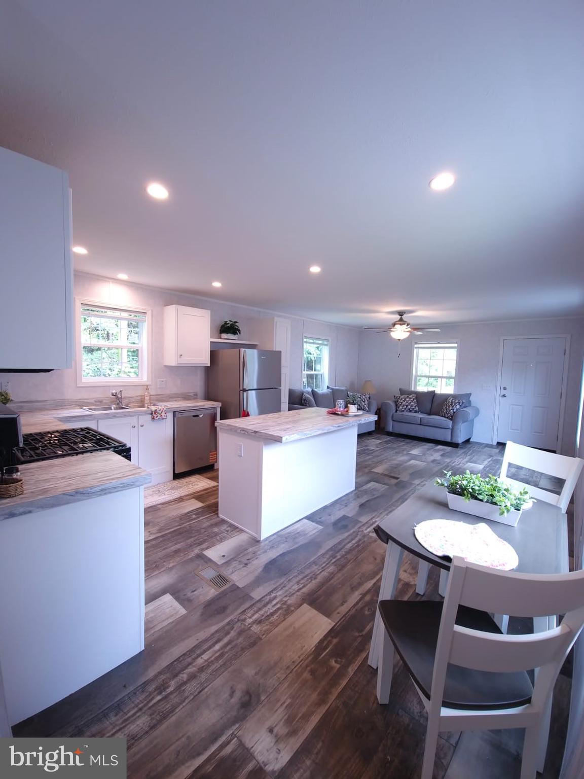 13 Montrose Boulevard Reading, PA 19607 - Photo 9 of 28 a large kitchen with a table and chairs in it