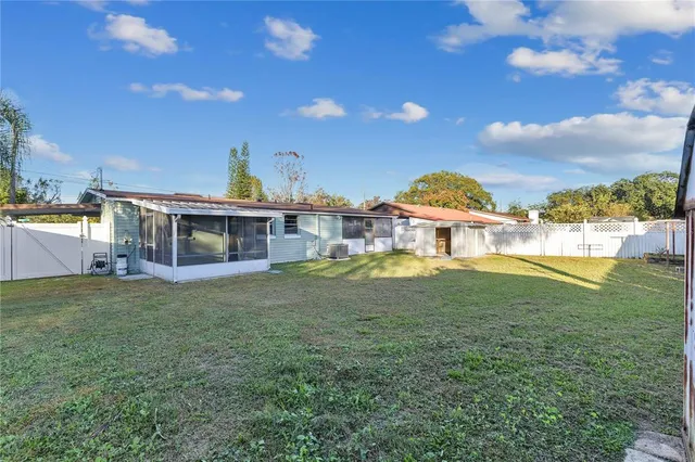 a view of a house with a big yard