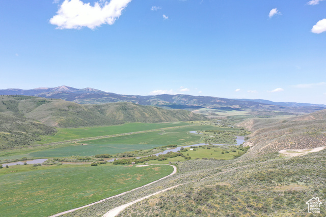 Undisclosed Address Georgetown, ID 83239 - Photo 8 of 11 View of mountain backdrop with a large body of water