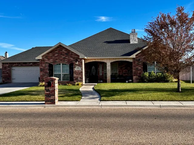 a view of a fireplace with wooden fence