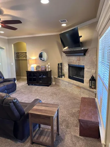 a bathroom with a granite countertop shower a sink and a bathtub