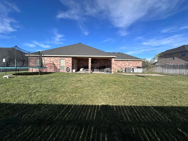 a kitchen with a stove and a sink