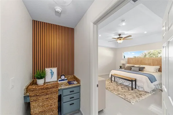 a bedroom with a bed and a dresser