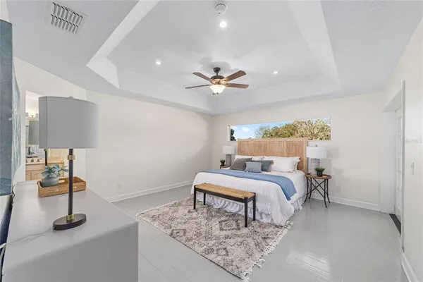 a bed room with bed and a table