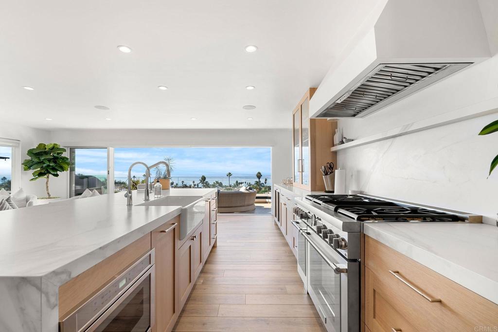 2172 Oxford Avenue Cardiff-by-the-Sea, CA 92007 - Photo 12 of 68 a kitchen with stove and cabinets