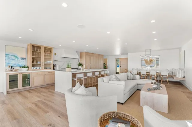 a bathroom with a double vanity sink mirror and shower