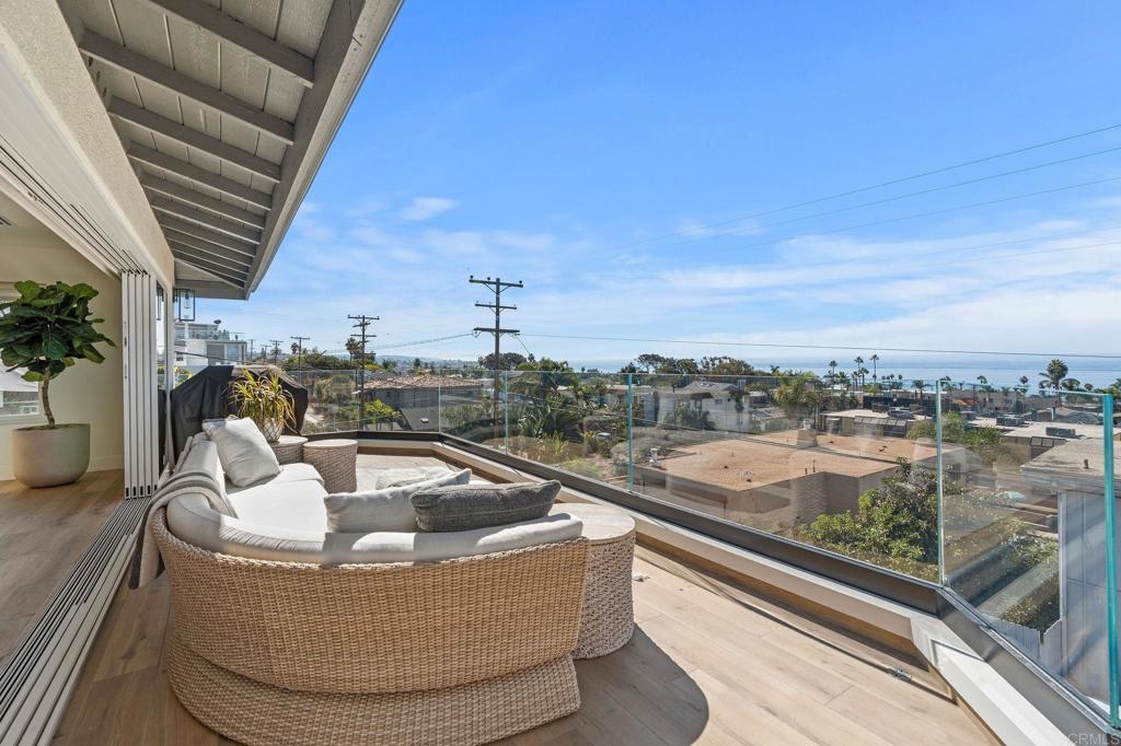 2172 Oxford Avenue Cardiff-by-the-Sea, CA 92007 - Photo 21 of 68 a view of a swimming pool with a lounge chair