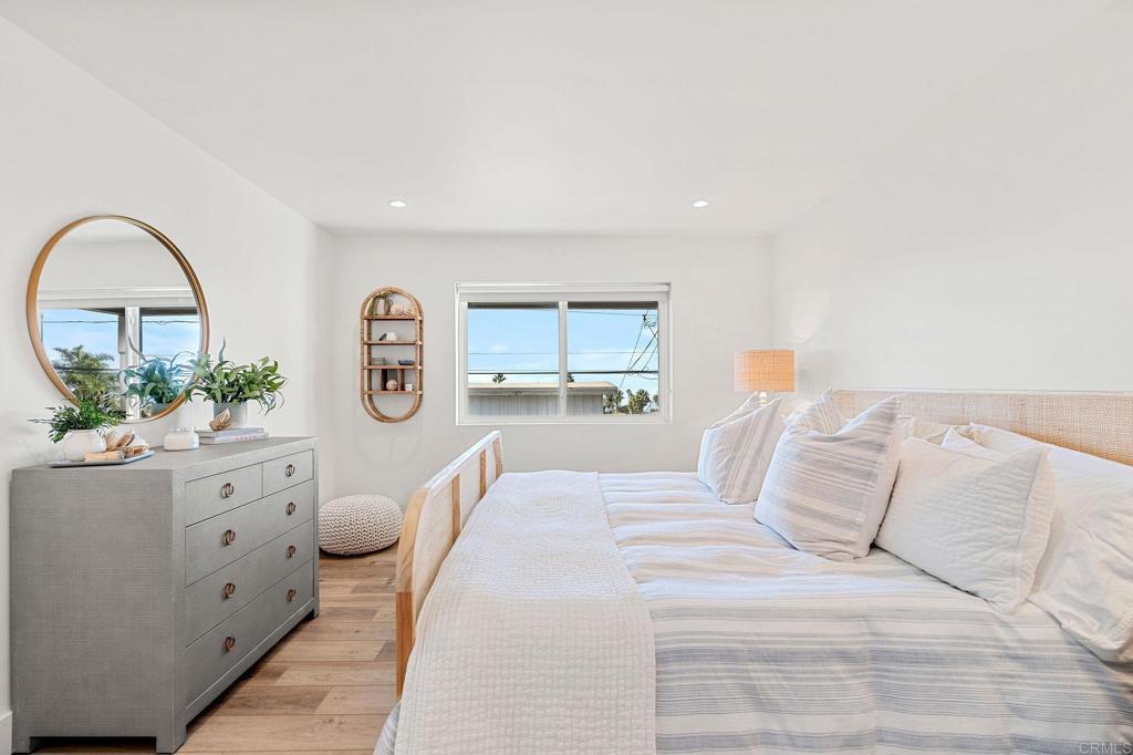 2172 Oxford Avenue Cardiff-by-the-Sea, CA 92007 - Photo 28 of 68 a large white bed in a white room