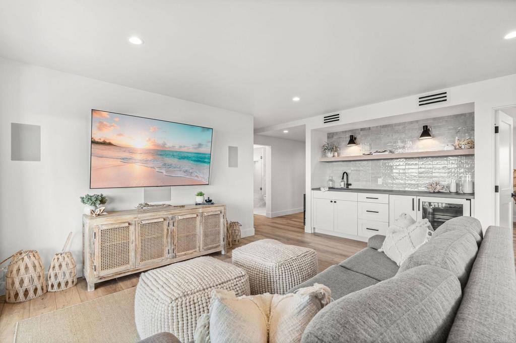 2172 Oxford Avenue Cardiff-by-the-Sea, CA 92007 - Photo 33 of 68 a living room with furniture and a flat screen tv