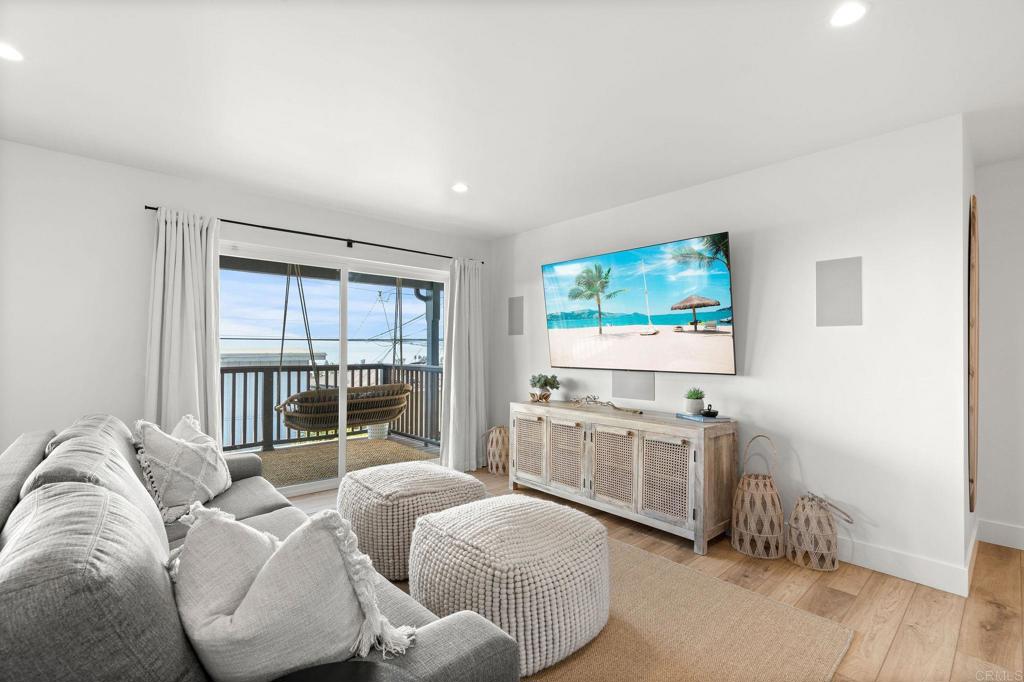 2172 Oxford Avenue Cardiff-by-the-Sea, CA 92007 - Photo 34 of 68 a living room with furniture and a flat screen tv