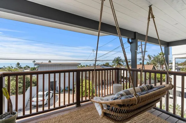 a bathroom with a sink mirror and window