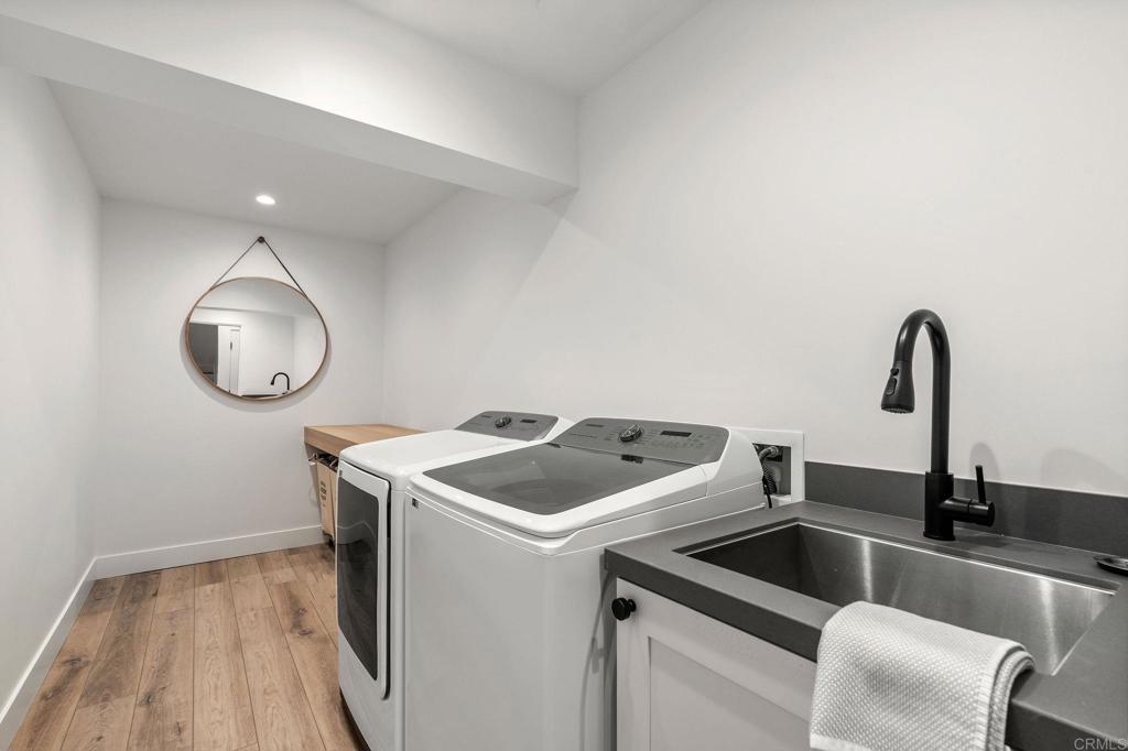 2172 Oxford Avenue Cardiff-by-the-Sea, CA 92007 - Photo 41 of 68 a kitchen with a sink and a stove